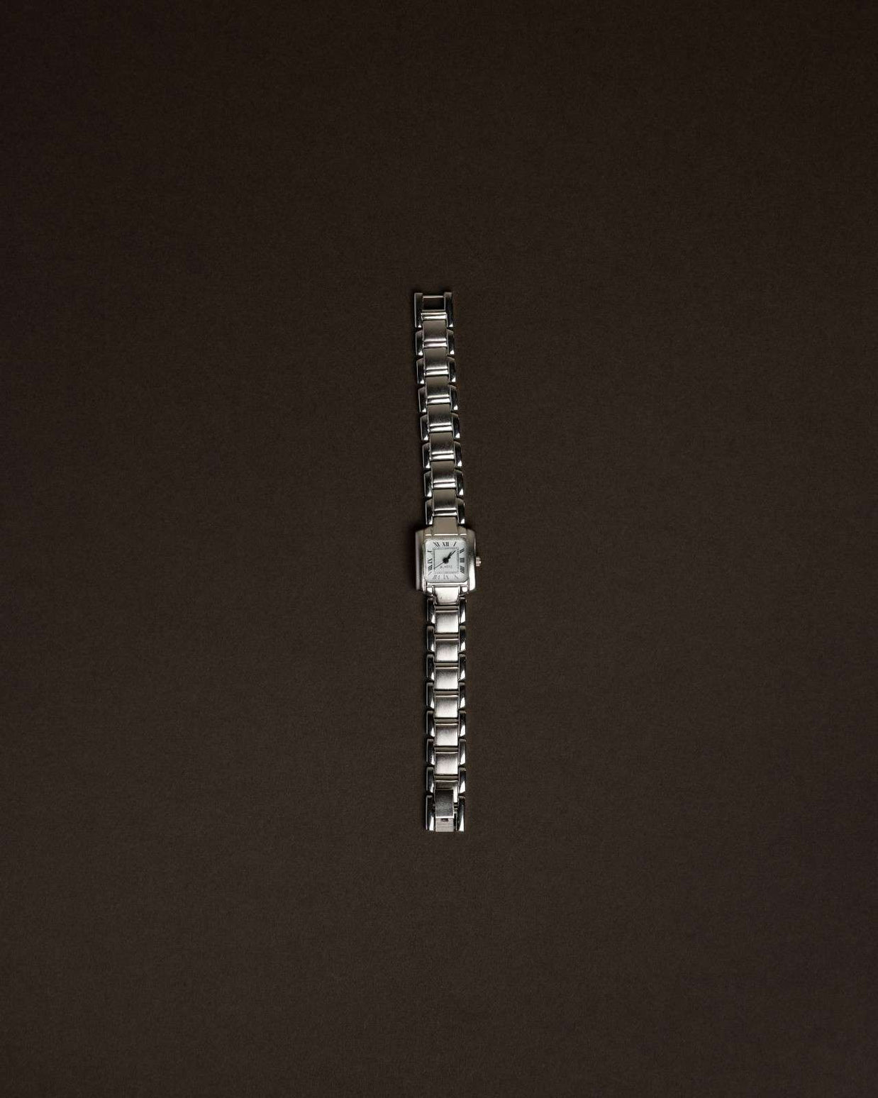 Silver Roman Dial Tank Watch