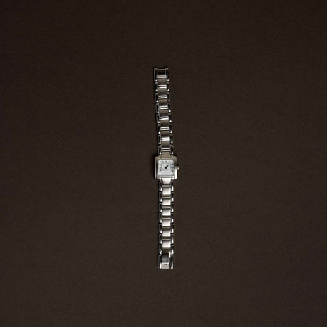 Silver Roman Dial Tank Watch