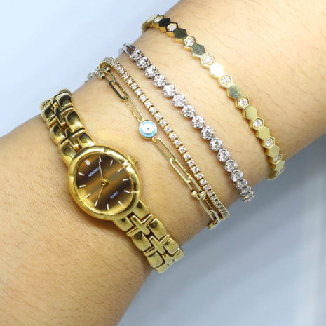 Sleek Gold-Tone Oval Face (Not-Running)