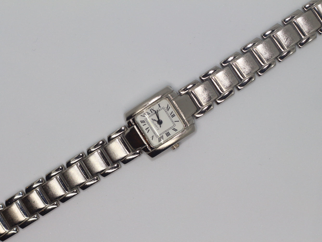 Silver Roman Dial Tank Watch